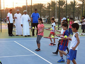 Children take part in a tennis training programme held at Sultan Qaboos Sports Complex on Monday. (Photo: Oman Tribune)