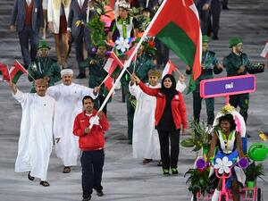Oman's flagbearer Hamed al-Khatri leads his delegation during the opening ceremony of the Rio 2016 Olympic Games at the Maracana stadium in Rio de Janeiro on August 5, 2016.
PEDRO UGARTE / AFP