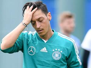 The 29-year-old playmaker of Turkish origin quit international duty, citing racial discrimination from German football officials over his meeting with Erdogan in May.