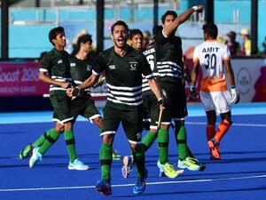 Pakistan players celebrate their 2-2 draw against India after their men's field hockey match between India and Pakistan at the 2018 Gold Coast Commonwealth Games on the Gold Coast on April 7, 2018.
Anthony WALLACE / AFP