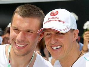 Podolski and Schumacher (picture courtesy of dailymail.co.uk)