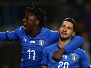 بوليتانو (يمين) يحتفل بهدفه رفقة زميله كين