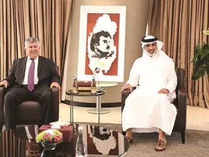 Qatar Football Association president Sheikh Hamad bin Khalifa bin Ahmed al-Thani (right) with his Iraqi counterpart Abdulkhaleq Masoud in Doha yesterday. (Photo: Qatar Times)