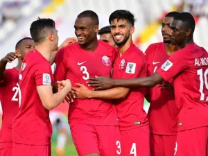 Qatar's defender AbdelKarim Hassan (3rd-L) celebrates after scoring a goal during the 2019 AFC Asian Cup group E football match between North Korea and Qatar at the Khalifa bin Zayed stadium in al-Ain on January 13, 2019.
Giuseppe CACACE / AFP