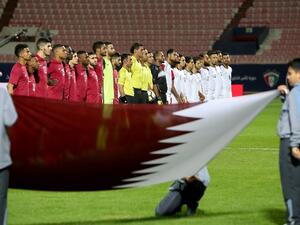 Qatar's and Yemen's starting eleven pose for a group picture ahead of the 2017 Gulf Cup of Nations football match between Qatar and Yemen at the Sheikh Jaber al-Ahmad Stadium in Kuwait City on December 23, 2017.
Yasser Al-Zayyat / AFP