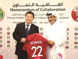 QFA president Sheikh Hamad bin Khalifa bin Ahmed al-Thani (right) with Vice Sports Minister of China and CFA acting president Du Zhaocai. (Photo: Gulf Times)