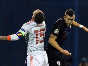 صراع على الكرة بين بيريشيتش وراموس