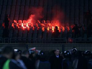 Riot police fill the stadium during clashes that erupted after a football match between Egypt's Al-Ahly and Al-Masry teams on February 1, 2012. AFP PHOTO/STR 