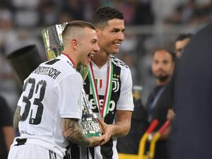  Juventus will return to Turin with the Supercoppa Italiana in tow after Cristiano Ronaldo's header sank AC Milan. 