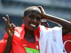 Bahrain's Ruth Jebet celebrates after winning the Women's 3000m Steeplechase Final during the athletics competition at the Rio 2016 Olympic Games at the Olympic Stadium in Rio de Janeiro on August 15, 2016.
FRANCK FIFE / AFP