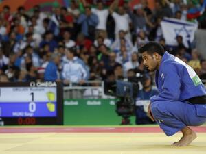Israel's Sagi Muki reacts after losing to Azerbaijan's Rustam Orujov during their men's -73kg judo contest semifinal B match of the Rio 2016 Olympic Games in Rio de Janeiro on August 8, 2016.
Jack GUEZ / AFP