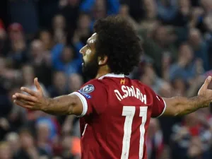 Liverpool's Egyptian midfielder Mohamed Salah celebrates scoring his team's second goal during the Champions League qualifier, second leg match between Liverpool and Hoffenheim at Anfield stadium in Liverpool on August 23, 2017.
Oli SCARFF / AFP
