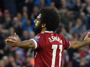 Liverpool's Egyptian midfielder Mohamed Salah celebrates scoring his team's second goal during the Champions League qualifier, second leg match between Liverpool and Hoffenheim at Anfield stadium in Liverpool on August 23, 2017.
Oli SCARFF / AFP