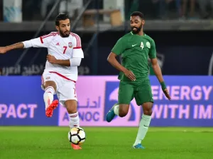 Saudi's Mohammed Al-Khabrani (R) vies for the ball with Emirates' Ali Mabkhout during the 2017 Gulf Cup of Nations football match between UAE and Saudi Arabia at the Sheikh Jaber al-Ahmad Stadium in Kuwait City on December 25, 2017.
GIUSEPPE CACACE / AFP