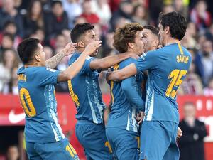 لاعبو أتلتيكو مدريد يحتفلون بهدف غريزمان