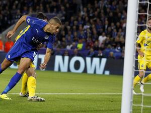 Leicester City's Algerian striker Islam Slimani heads the ball to score his team's first goal during the UEFA Champions League group G football match between Leicester City and Porto at the King Power Stadium in Leicester, central England on Septmeber 27, 2016.
Ian Kington / AFP
