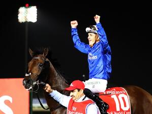 Jockey Christophe Soumillon gestures as he rides Thunder Snow after winning the Dubai World Cup horse race at the Dubai World Cup in the Meydan Racecourse on March 31, 2018 in Dubai. 
KARIM SAHIB / AFP