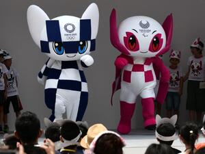 Mascots for the Tokyo 2020 Olympics Games Miraitowa (L) and Someity appear at their debut event in Tokyo on July 22, 2018. The organisers of the Tokyo 2020 Olympics and Paralympics Games announced the names of the mascots on July 22.
Kazuhiro NOGI / AFP