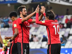 Urawa Reds' Japanese midfielder Yosuke Kashiwagi (L) celebrates after scoring a goal with Urawa Reds' Brazilian defender Mauricio Antonio during the fifth place FIFA Club World Cup UAE 2017 football match Wydad Casablanca vs Urawa Reds at Hazza Bin Zayed Stadium on December 12, 2017 in Al Ain.
GIUSEPPE CACACE / AFP