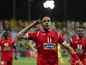 Kamal Kamyabinia celebrates after scoring