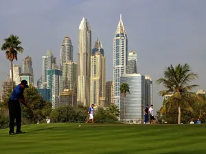 Tiger Woods of the United States follows his ball after playing a shot during the Dubai Desert Classic golf tournament at the Emirates Golf Club in Dubai on February 2, 2017.
NEZAR BALOUT / AFP