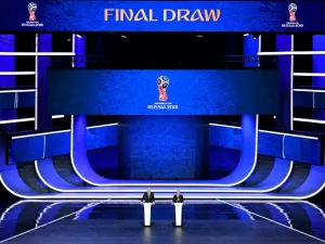 FIFA president Gianni Infantino (L) and Russian President Vladimir Putin speak on stage ahead of the Final Draw for the 2018 FIFA World Cup football tournament at the State Kremlin Palace in Moscow on December 1, 2017. The 2018 FIFA World Cup will be held from June 14 and July 15, 2018, in 11 Russian cities.
Mladen ANTONOV / AFP