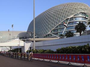 Cyclists ride their bikes during the Abu Dhabi tour from the Yas Marina Circuit to Yas Mall where the tour finishes in the Emirati capital Abu Dhabi, on October 11, 2015. AFP PHOTO / STR
STR / AFP