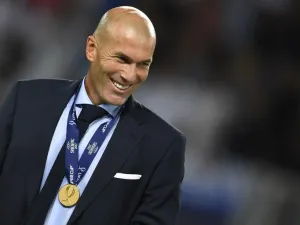Real Madrid's French coach Zinedine Zidane smiles with his medal after winning the UEFA Super Cup football match between Real Madrid and Manchester United on August 8, 2017, at the Philip II Arena in Skopje.
Dimitar DILKOFF / AFP