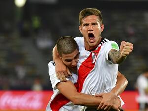 Argentina's River Plate Bruno Zuculini (R) celebrates his goal during their match for third place in the FIFA Club World Cup football competition at the Zayed Sports City Stadium in Abu Dhabi, the capital of the United Arab Emirates, on December 22, 2018.
Giuseppe CACACE / AFP