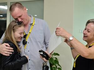 Student celebrates result at GEMS Wellington International School