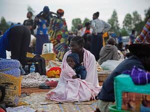 A woman and child pictured at a make-shift camp in the Amuru District of Uganda, which borders war-torn South Sudan, on July 16, 2016. (AFP/Isaac Kasamani)