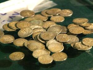 Ancient coins from Syria are being sold on Facebook (AFP/Louai Beshara)