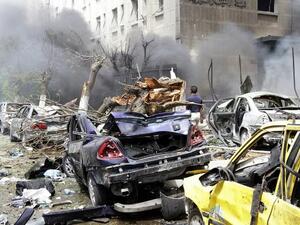 Damascus is rocked by a huge car bomb, which was followed by intense gunfire (AFP/ Louai Beshara)