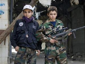 Free Syrian army's young fighters pose on April 2 (Guillaume Briquet/ AFP)