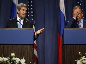 US Secretary of State John Kerry (L) and Russian Foreign minister Sergei Lavrov give a joint press conference in Geneva following their meeting on Syria's chemical weapons, on September 12, 2013. [AFP]