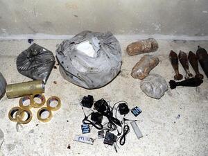 SYRIA, JOBAR : A handout picture released by the Syrian Arab News Agency (SANA) on August 24, 2013 shows bags of what the Syrian government claims to be materials used to make chemical weapons discovered in Jobar on the outskirts of the capital Damascus. AFP PHOTO / HO / SANA" 