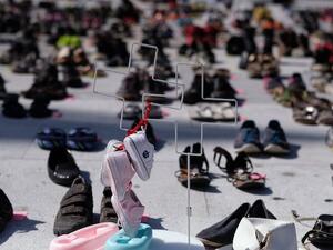 Shoes set aside to represent the thousands who likely died during Hurricane Maria (RICARDO ARDUENGO/AFP) Shoes set aside to represent the thousands who likely died during Hurricane Maria (RICARDO ARDUENGO/AFP)