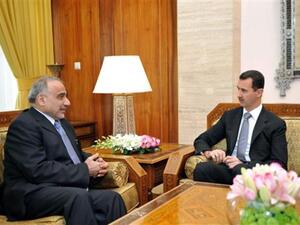 الرئيس الاسد مستقبلا نائب الرئيس العراقي/أ.ف.ب