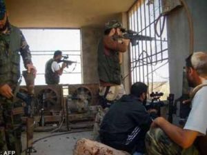 مقاتلون من المعارضة في حلب/أ.ف.ب