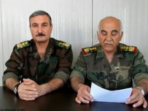 صورة ارشيفية للعميد مصطفى الشيخ والعقيد رياض الاسعد 