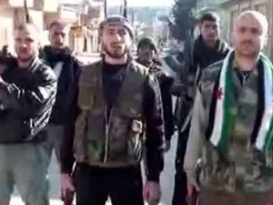 مقاتلون في احدى ضواحي دمشق/صورة عن الانترنت