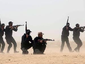 Shiite militiamen train in Iraq.  Iraq's Shiite Popular Mobilization force has been instrumental in combatting Daesh.  (AFP/File)