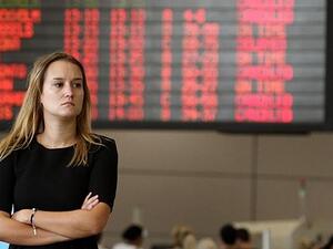 A woman waits at Ben Gurion international airport near Tel Aviv.  (AFP/File)