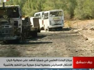 صورة عن التلفزيون الرسمي السوري لموقع الضربة الاسرائيلية/أ.ف.ب