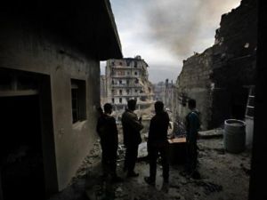 عناصر من لواء صلاح الدين في بلدة كرمل الجبل شرقي حلب/أ.ف.ب