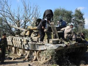 مازالت بعض أحياء حمص خارج سيطرة القوات النظامية