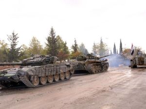 دبابات للجيش السوري النظامي في حلب،امس/أ.ف.ب