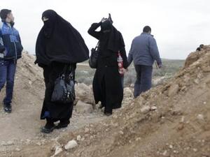 سوريون يفرون من العنف الى الاردن/أ.ف.ب