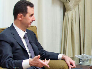 Syrian President Bashar al-Assad. An interview to a local newspaper in Damascus on July 02, 2013. (AFP PHOTO / SANA)