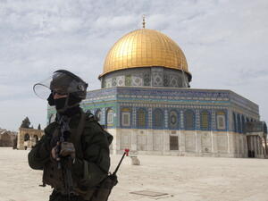 Israeli riot police walk at Jerusalem's al-Aqsa mosque compound during clashes with Palestinian demonstrators following Friday prayers on March 8, 2013. [Ahmad Gharbali/Getty Images]